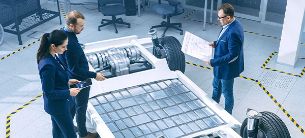 people standing over car thermal cells